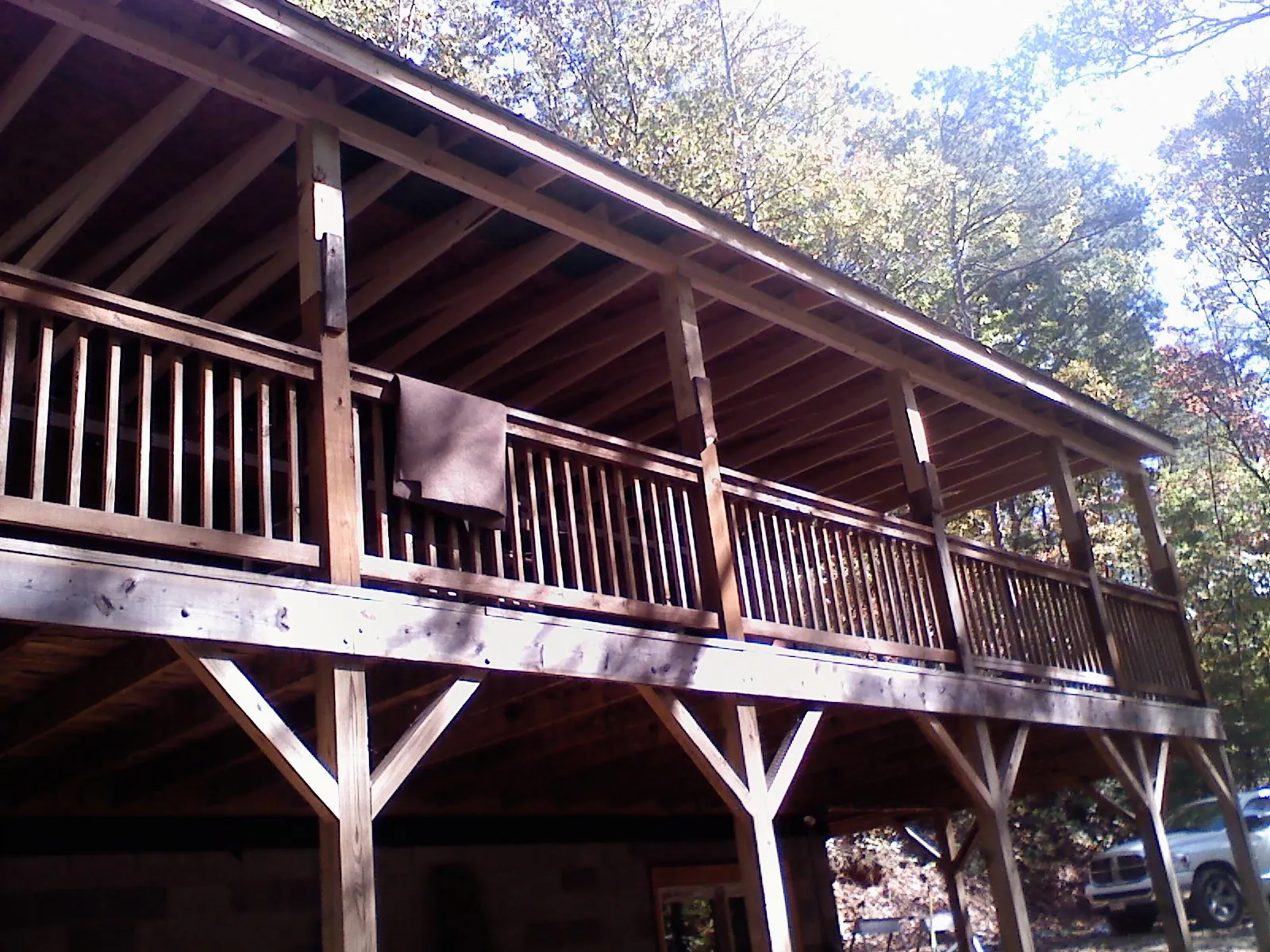 Timber framing under a new elevated porch and deck — Roof Leak Repair in Asbury by Roofing Brothers